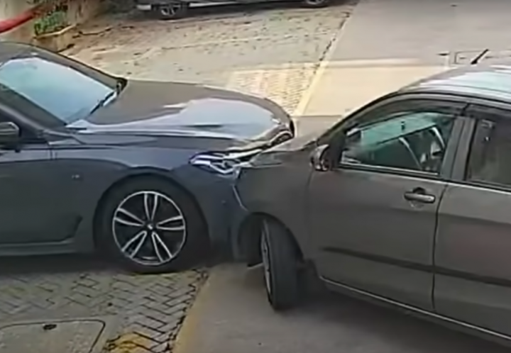 Neighbour crashes her car into my BMW 630d in building parking area 