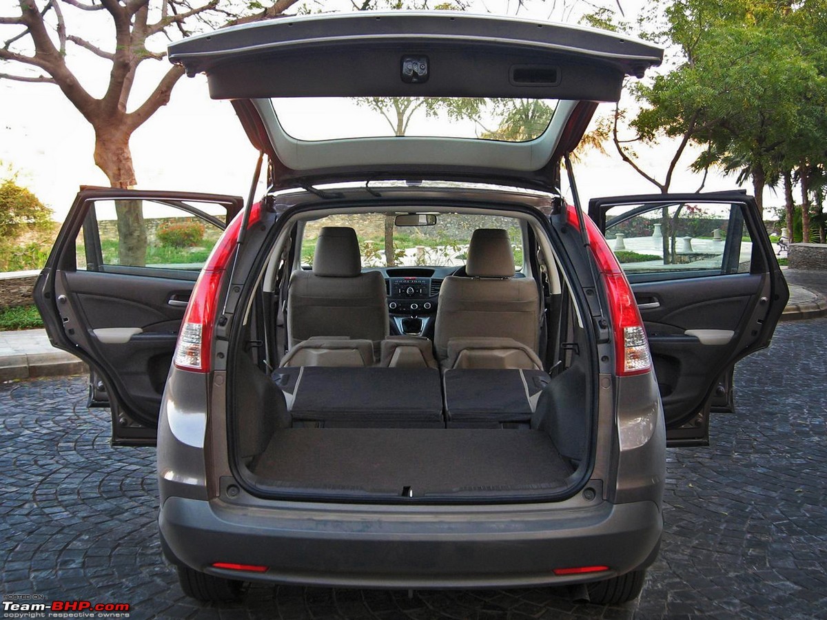 Универсалы с большим багажником. Honda CR-V 2008 багажник. Honda CR-V 2004 багажник. Honda CR-V 2008 салон багажник. Honda CR-V 3 поколение багажник.