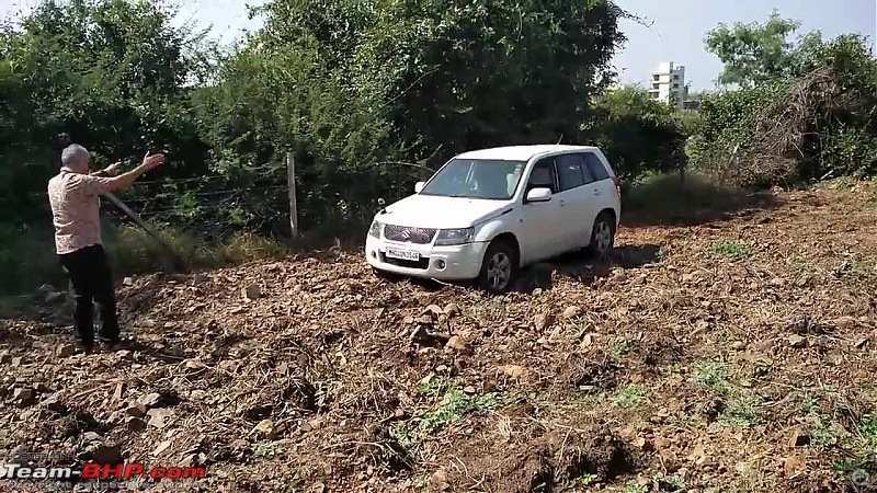 A Mercedes GL, 2 Grand Vitaras, a Sugarcane farm and a tow cable-033-mt-gingerly-crossing-furrow.jpg