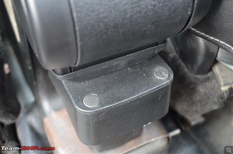 DIY: Armrest installation in the Maruti Swift!-9.-rubber-covers-screw-holes.jpg