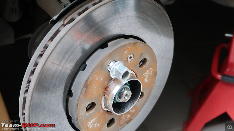 Installing an OEM 288mm Big Brake Kit | VW Polo-holding-rotor.png