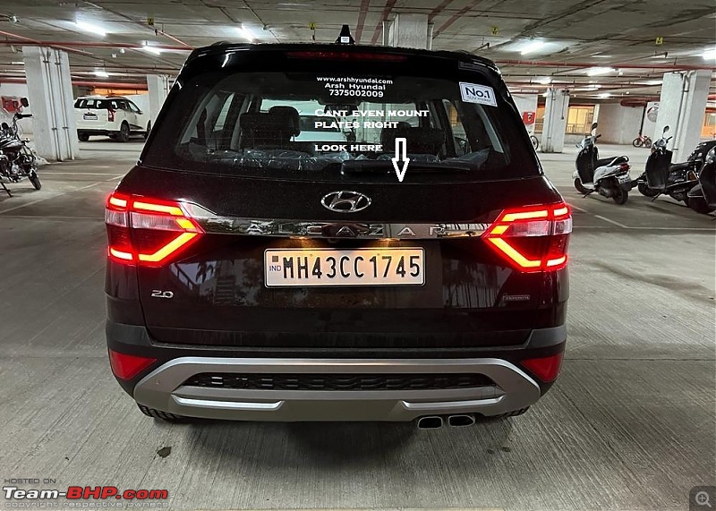 Brand new Hyundai Alcazar: Number plate riveted on crookedly by the dealer-arsh.jpg