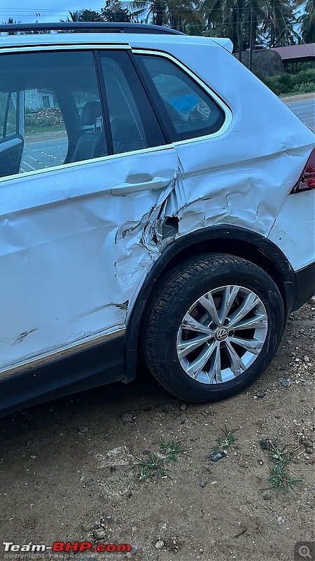 Renault Duster crashes hard into my VW Tiguan | Need advice-damagedleftdoor.jpg