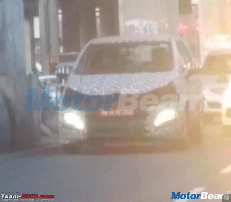 The Mahindra Marazzo MPV. EDIT: Now launched-mahindrau321frontthreequartersspyshot.jpg