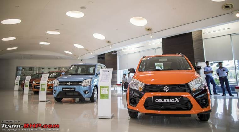 Car dealerships & factories are slowly opening in India-carsalesmarutishowroombloomberg759.jpg