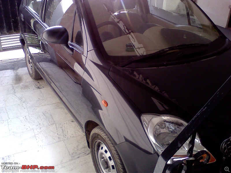 Moved from a Honda City to Chevy Spark! Learnings from the downgrade-parked.jpg