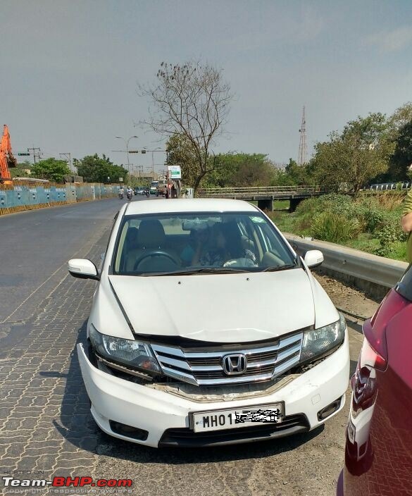 The "Duma" comes home - Our Tuscan Red Mahindra XUV 5OO W8 - EDIT - 10 years and  1.12 Lakh kms-rearended-1.jpg