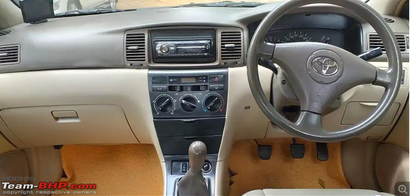2003 Toyota Corolla H4 Automatic Review  The Blue Beauty!-corollahecenterconsolesteering.png