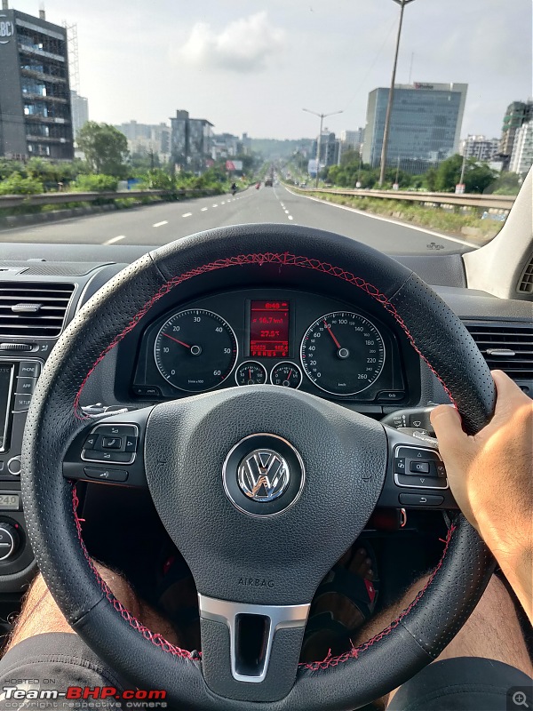 Our first tryst with Volkswagen | Ownership Review of our MK5 VW Jetta-driver-seat-highway-2.jpg