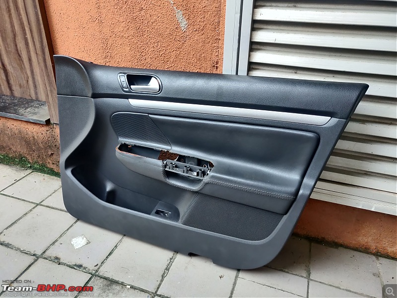 Our first tryst with Volkswagen | Ownership Review of our MK5 VW Jetta-driver-door-pad-taken-out.jpg