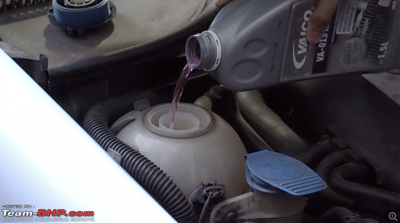 Our first tryst with Volkswagen | Ownership Review of our MK5 VW Jetta-coolant-topup-vaico.png