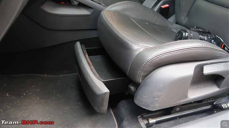 Our first tryst with Volkswagen | Ownership Review of our MK5 VW Jetta-clever-underseat-storage.jpg
