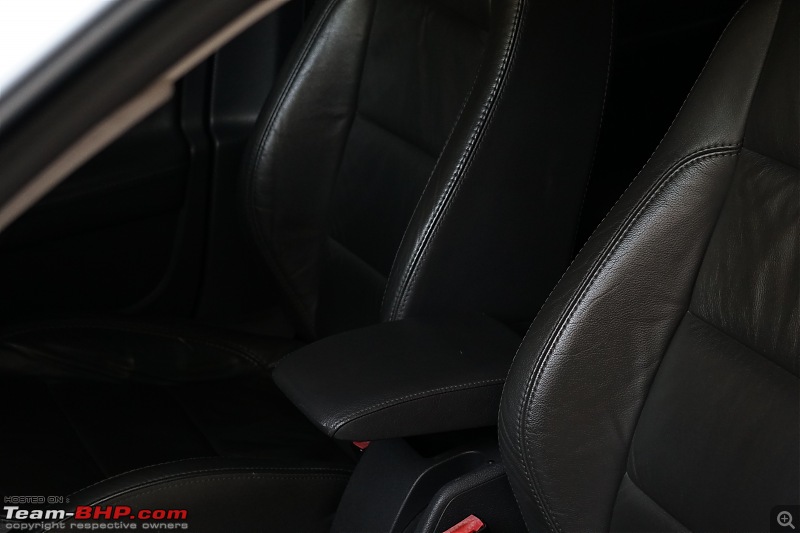 Our first tryst with Volkswagen | Ownership Review of our MK5 VW Jetta-sliding-armrest.jpg