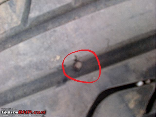 VW Vento Highline TDi, My Silver Streak - 5 years, 78000 kms and still raring for many more-nail-tyre.jpg