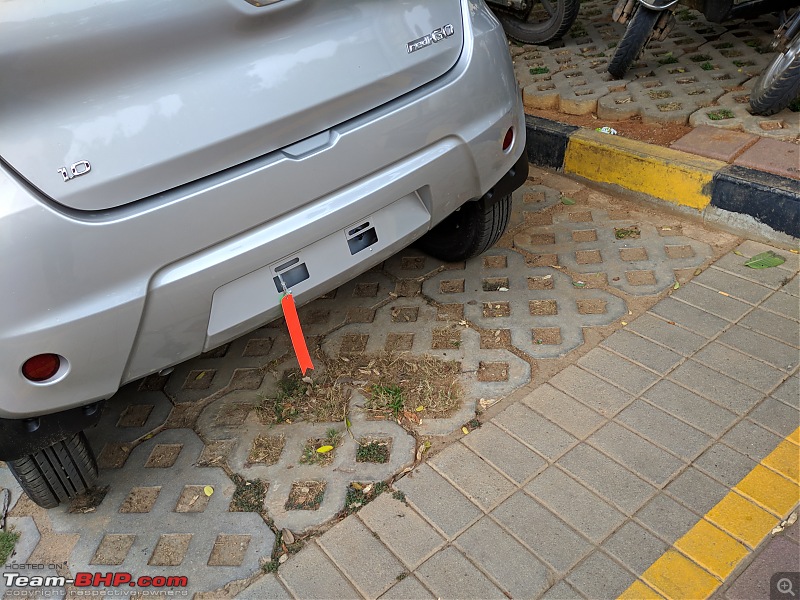 What are those colorful straps hanging off the rear tow hook of cars?-img_20180518_165142.jpg