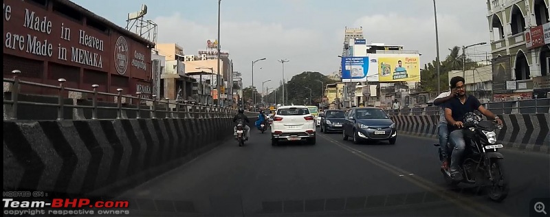 Bad Drivers - How do you spot 'em-pillion-holding-phone-rider-talk-while-riding.jpg