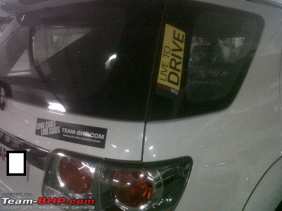 Team-BHP Stickers are here! Post sightings & pics of them on your car-wanderers-fortuner.jpg