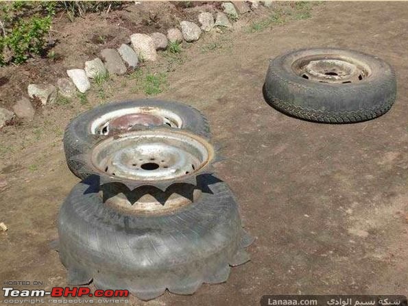 Use of Old car tire, Tire Art! Beautifully done, Must see.-tire-art5.jpg