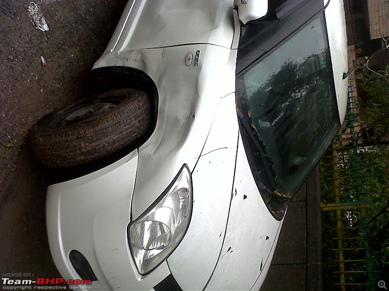 My parked Swift VDi smashed by an Innova-img00115201302051306.jpg