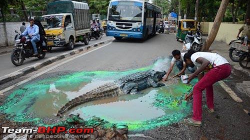 Pothole problems - Bengaluru artists use creative methods to embarrass civic authorities-25.jpg