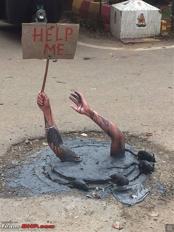 Pothole problems - Bengaluru artists use creative methods to embarrass civic authorities-hand.jpg