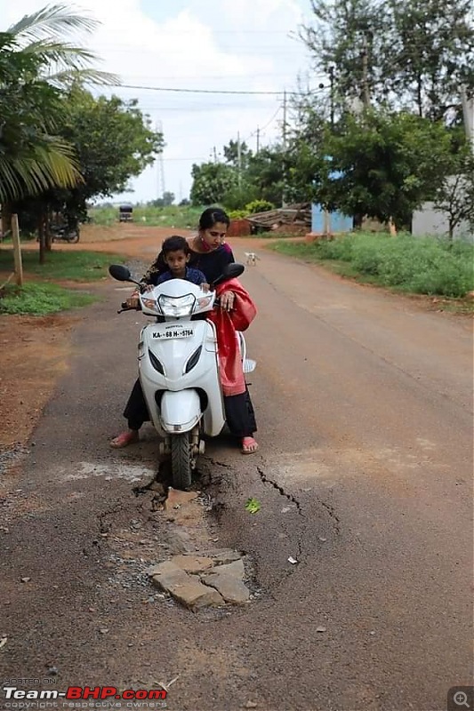 Novel Couple Photoshoot on potholed roads to grab the attention of the Government-74495961_2815527598499541_4189008404108279808_n.jpg