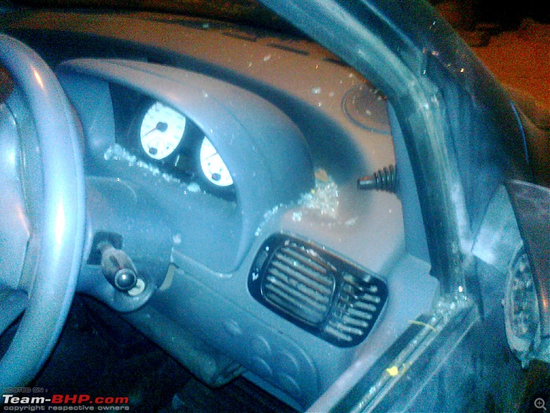 Diwali destruction: ORVMs and driver's side window shattered by exploding atom bombs-photo0832.jpg
