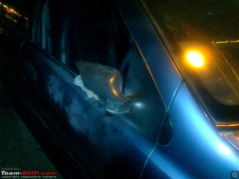 Diwali destruction: ORVMs and driver's side window shattered by exploding atom bombs-photo0834.jpg