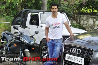 Bollywood Stars and their Cars-johnabrahamwithhisnewaudiq79.jpg