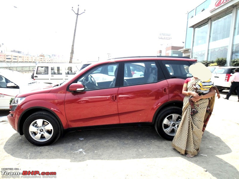 Sita, Red Mahindra XUV5OO W8 joins our Family. EDIT: 1 Year & 35,000 kms up-delivery.jpg