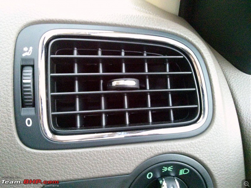 Candy white 2014 Skoda Rapid Elegance comes home-chrome-vents.jpg