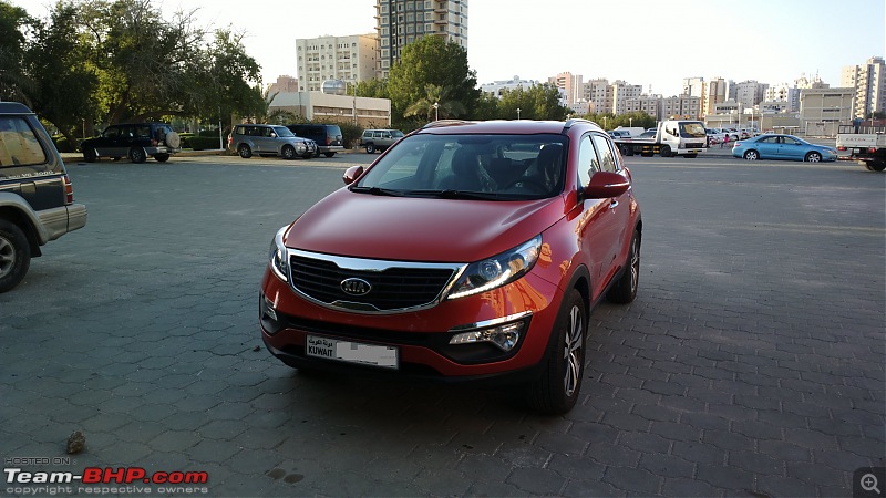 Its orange and it's sexy  My 2014 Kia Sportage-front-side-profile.jpg