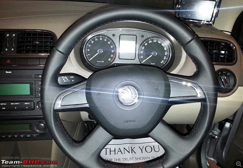 Candy white 2014 Skoda Rapid Elegance comes home-rapidsteeringwheel.jpg