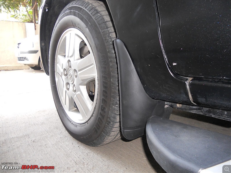 Toyota Innova: My Pre-worshipped Black Workhorse-lhs-front-wheel-mudflap-exterior-shot.jpg