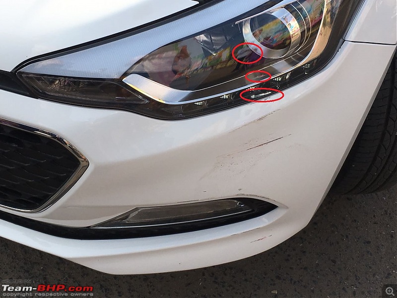 White Stallion for my son - Hyundai Elite i20-headlamp-scratches.jpg