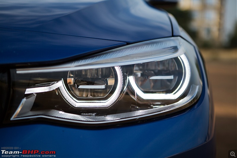 A GT joins a GT - Estoril Blue BMW 330i GT M-Sport comes home-headlight.jpg