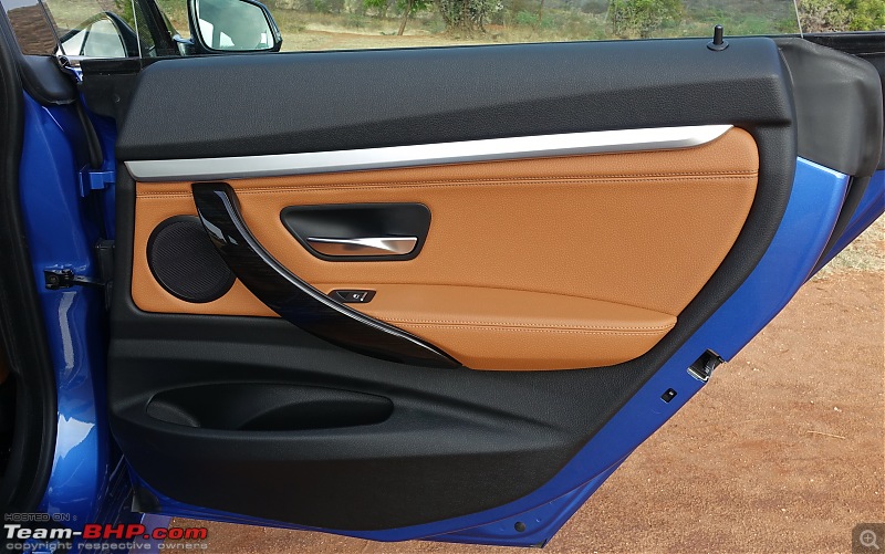 A GT joins a GT - Estoril Blue BMW 330i GT M-Sport comes home-door-rear.jpg