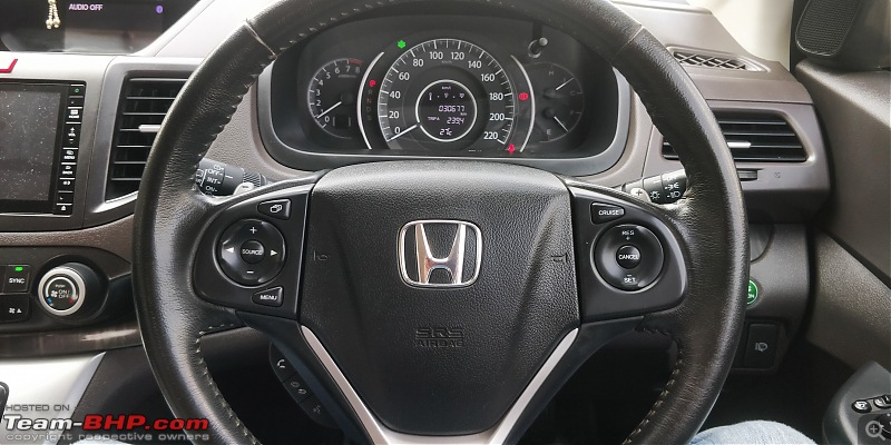 Heart over head! My pre-owned Honda CR-V 2.4L AWD-1.3-steering.jpg