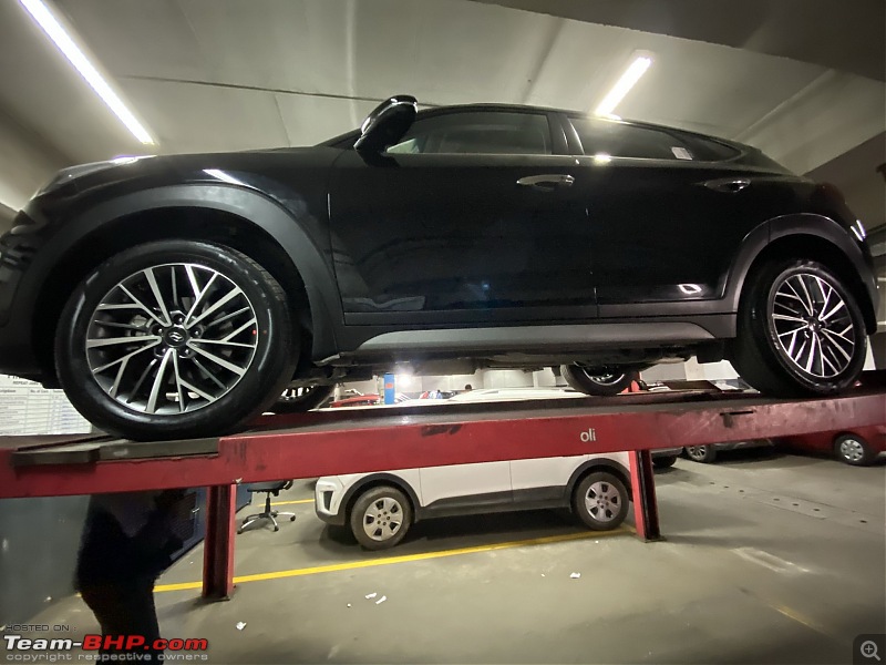My Black 2020 Hyundai Tucson GLS Diesel AT | An Ownership Review | EDIT: 30,000 km update-being_hoisted_up_for_a_look.jpg