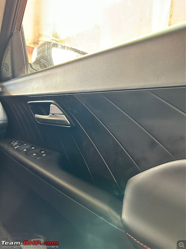 2023 Hyundai Verna SX(O) TGDi MT Tellurian Brown Ownership Review | The Quest for a Powerful Sedan-interior-door-pad.jpeg