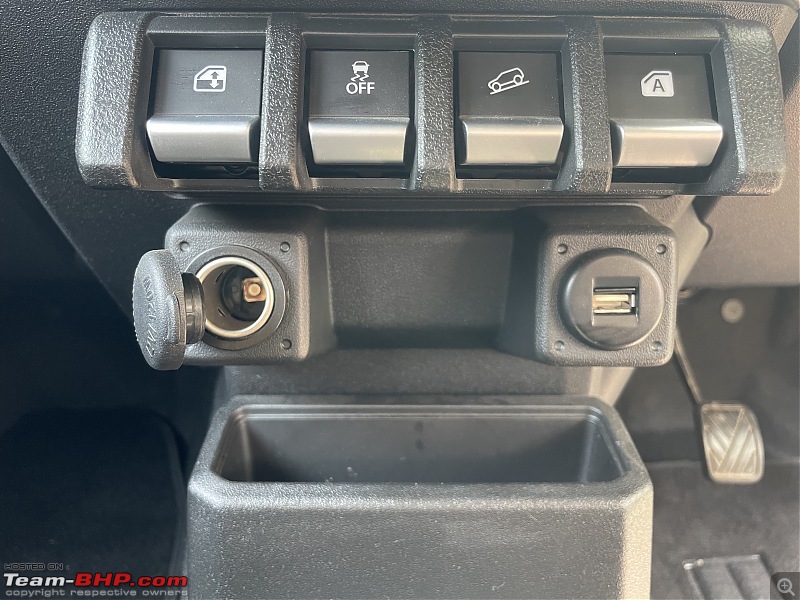 Maruti Jimny Zeta MT Review-central-phone-holder-charger-slot.jpg