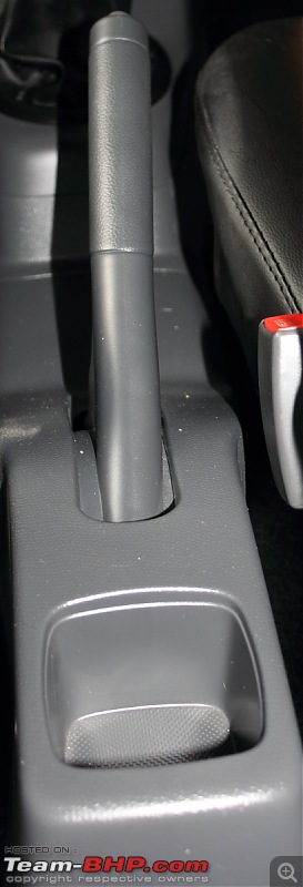 Swift Lxi (Codenamed "Dark Angel") - Detailed Ownership Review-rear-cup-holder-handbrake-lever.jpg