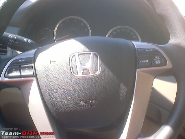 Got My Brand new 2009 Honda Accord 5 speed A/T-steering.jpg