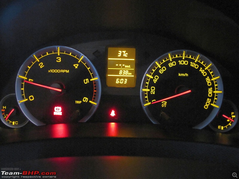 Maruti Dzire Zdi Initial Ownership review-console.jpg