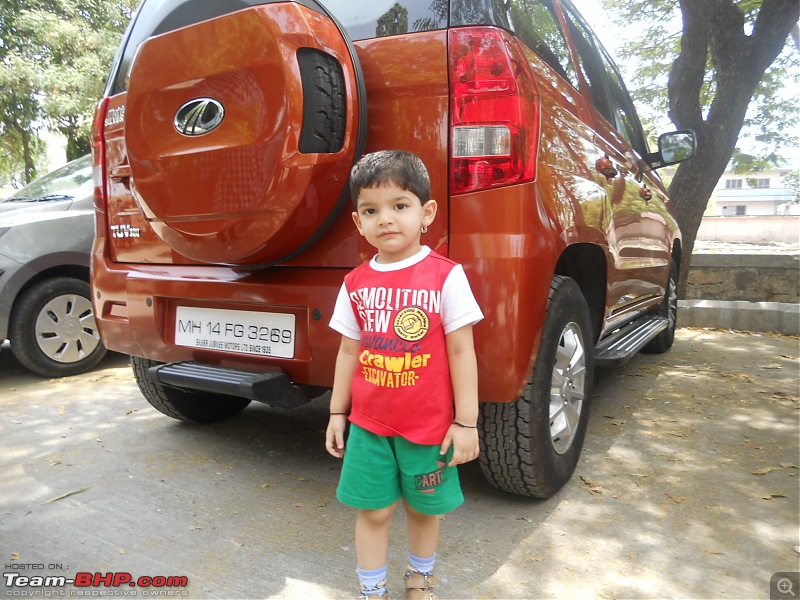 Short Sunday drive to Theur Chintamani & Bhuleshwar Temples-my-kid-posing-before-orange-tank.jpg