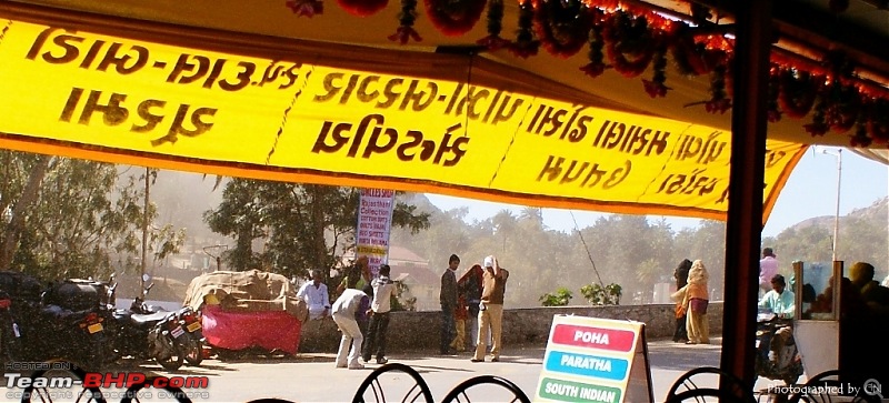 An Incredible Road Trip of a Lifetime to Udaipur, The Most Romantic City in the World-27-a_view_from_the_restaurant_people_covering_themselves_to_avoid_the_dust.jpg