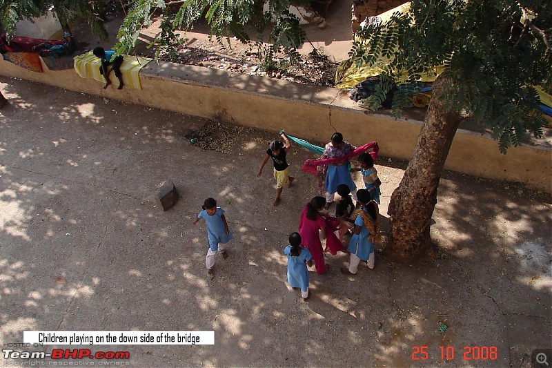 MP: Temples,Hills, Marble Rocks, Water falls, Tigers, Erotic Statues and.....-children-playing-down-bridge.jpg