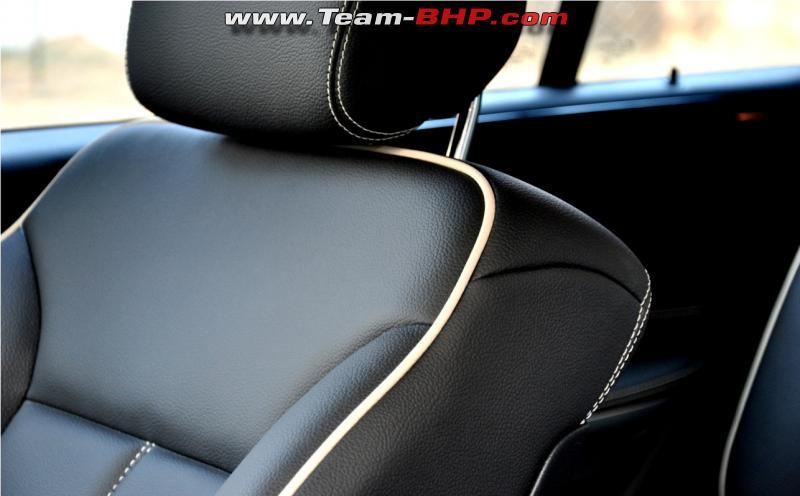 Interior - Black Leather upholstery with white top-stitch and piping