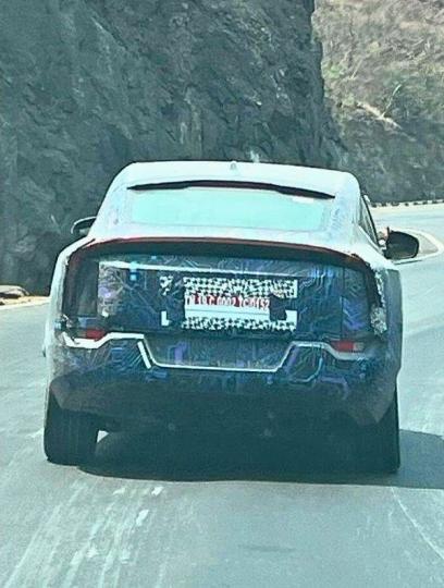 Mahindra XUV.e9 electric SUV spied in near-production form 