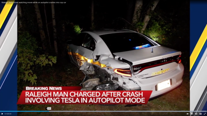 Tesla on Autopilot with driver watching movie hits cop car 